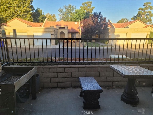 view of patio with a garage