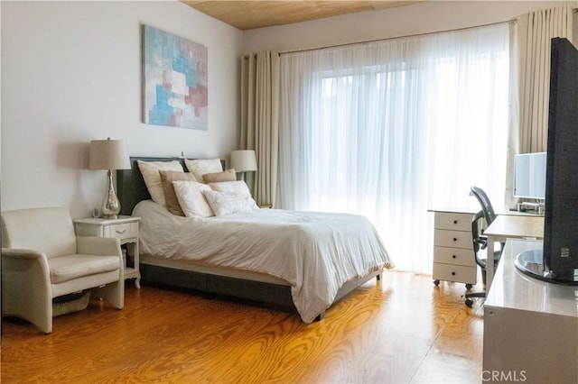 bedroom featuring hardwood / wood-style floors