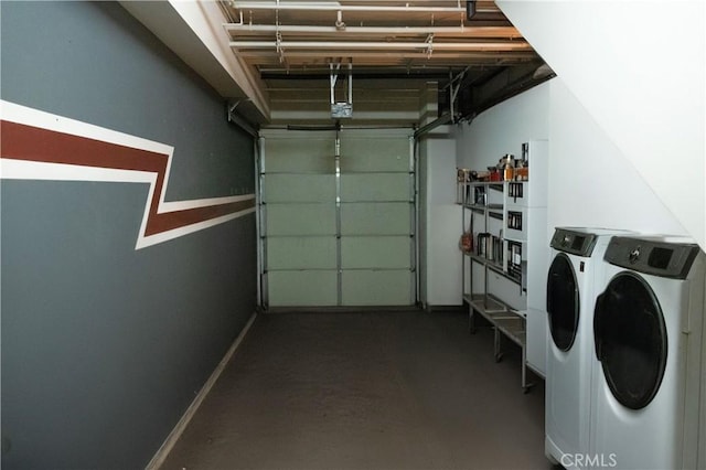 garage with washing machine and clothes dryer