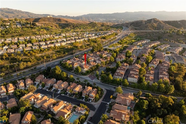 drone / aerial view featuring a mountain view