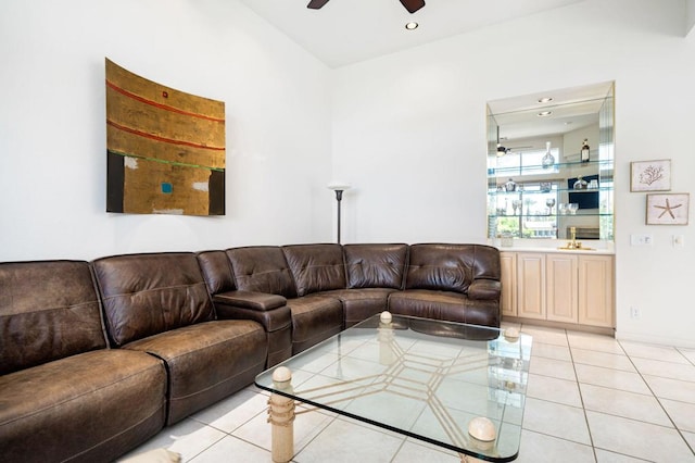 tiled living room featuring a towering ceiling