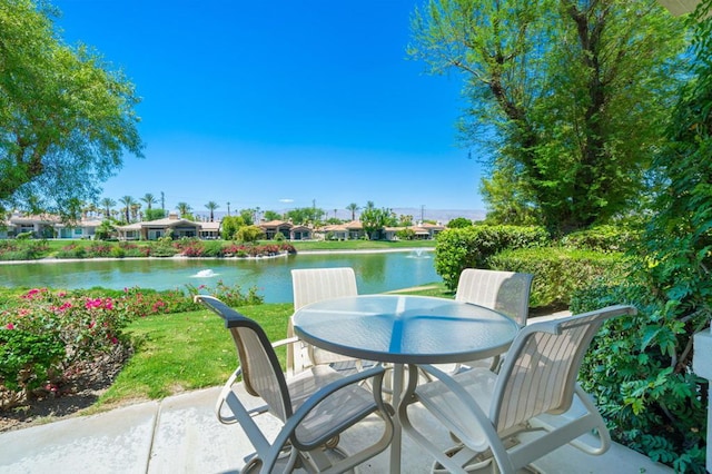 view of patio / terrace with a water view