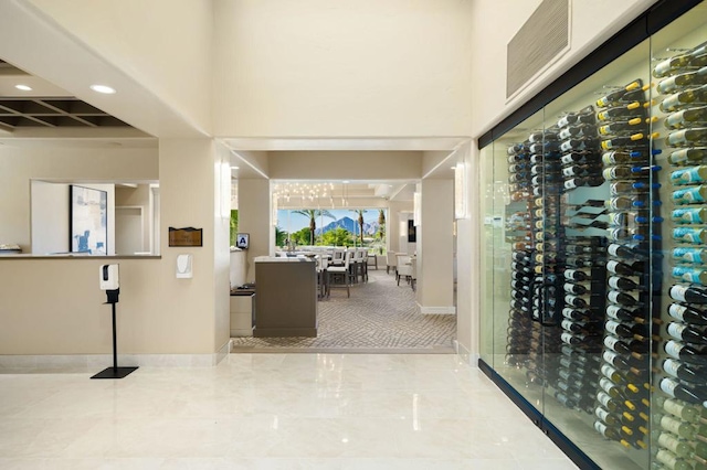 wine room with a towering ceiling