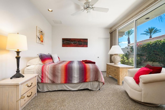 carpeted bedroom featuring ceiling fan