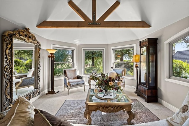 sunroom / solarium with vaulted ceiling with beams