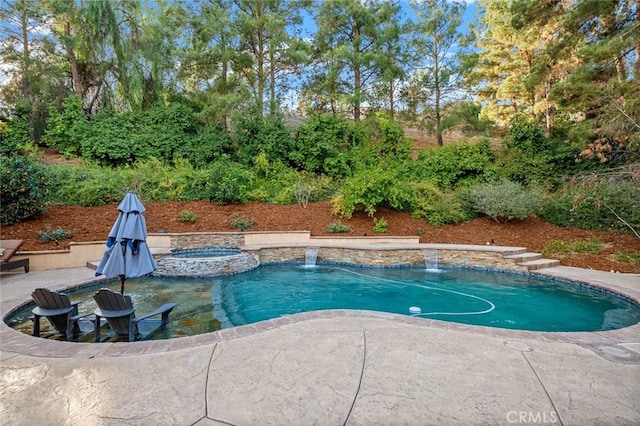 view of pool with a patio area, an in ground hot tub, and pool water feature