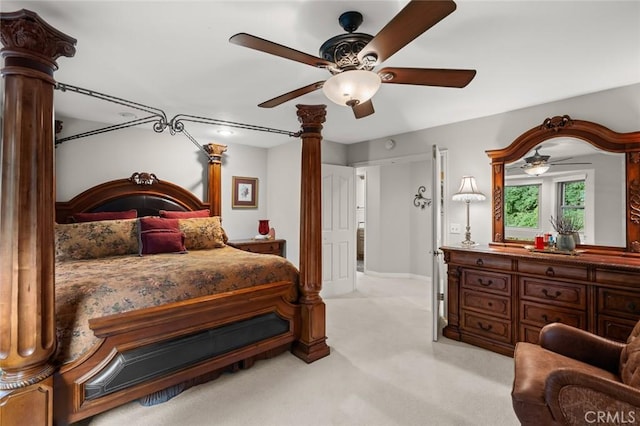 bedroom featuring ceiling fan and light colored carpet