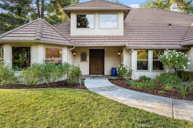 view of front of home with a front yard