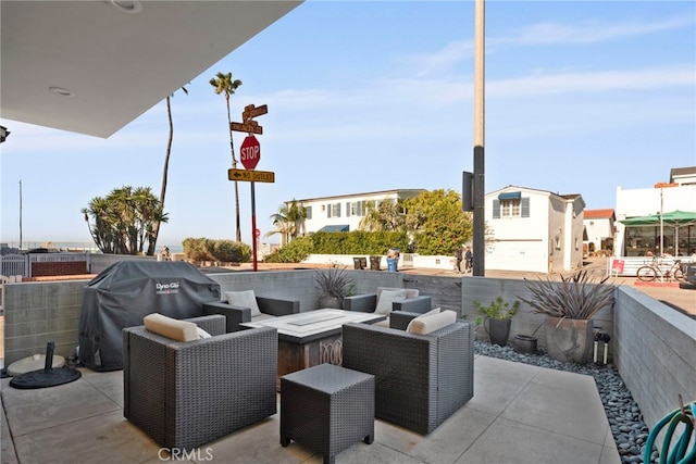 view of patio featuring a grill