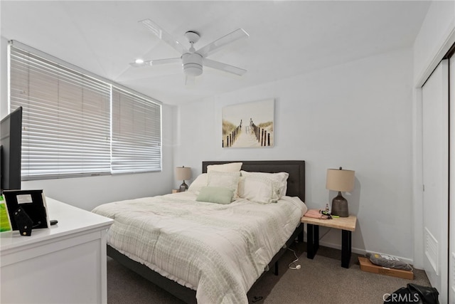 bedroom with carpet flooring, ceiling fan, and a closet