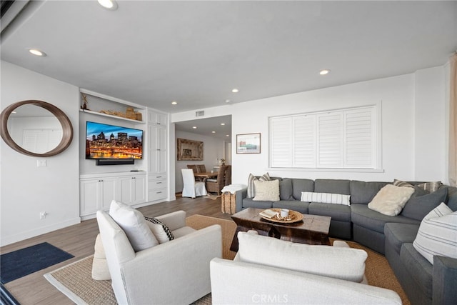 living room featuring dark hardwood / wood-style floors