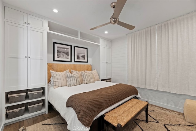 bedroom featuring ceiling fan and wood-type flooring