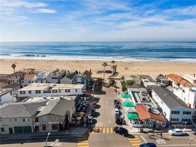 bird's eye view with a view of the beach and a water view