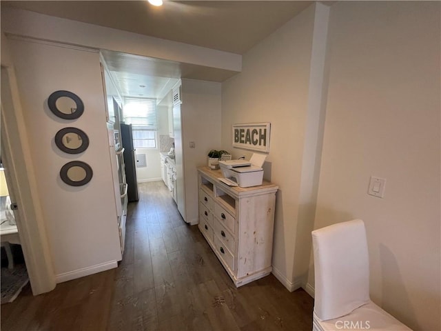 hall featuring dark wood-type flooring