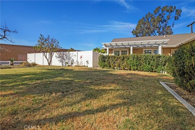 view of yard with a pergola