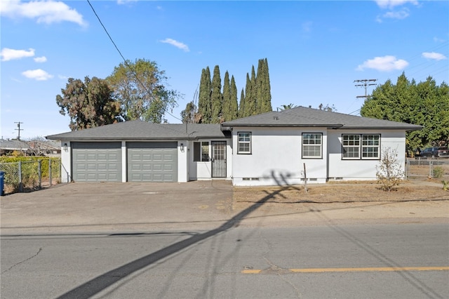 single story home with a garage