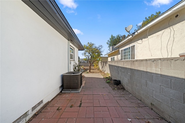 view of patio / terrace featuring cooling unit