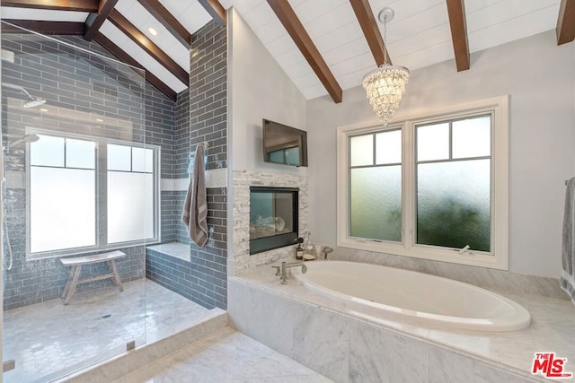 bathroom with a chandelier, independent shower and bath, and vaulted ceiling with beams