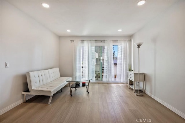 sitting room featuring light wood-type flooring