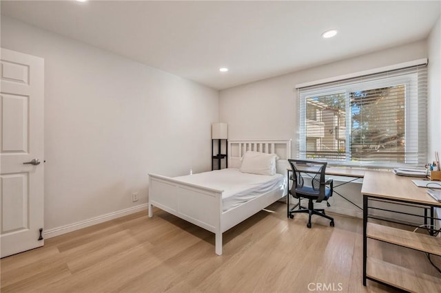 bedroom featuring light hardwood / wood-style flooring