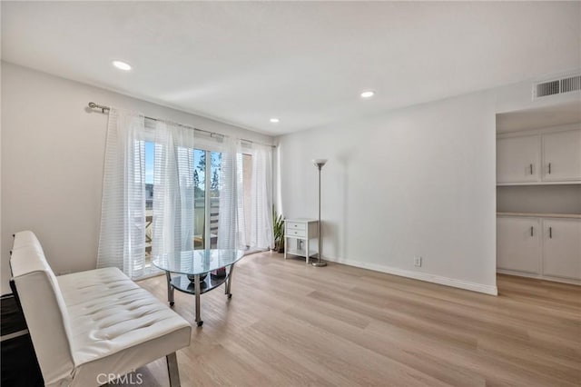 living area featuring light wood-type flooring