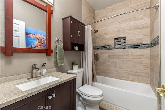 full bathroom with toilet, vanity, and shower / tub combo