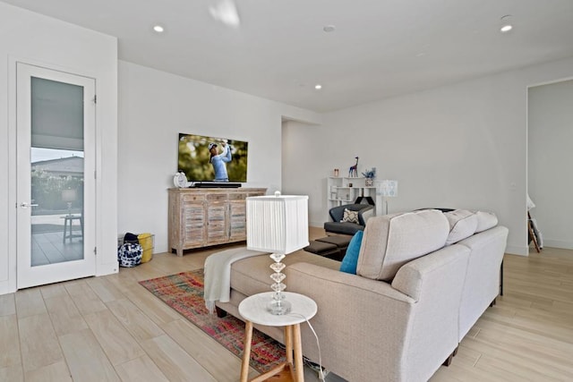 living room with light hardwood / wood-style floors