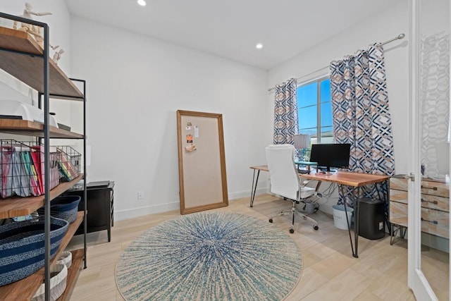 office area with light wood-type flooring