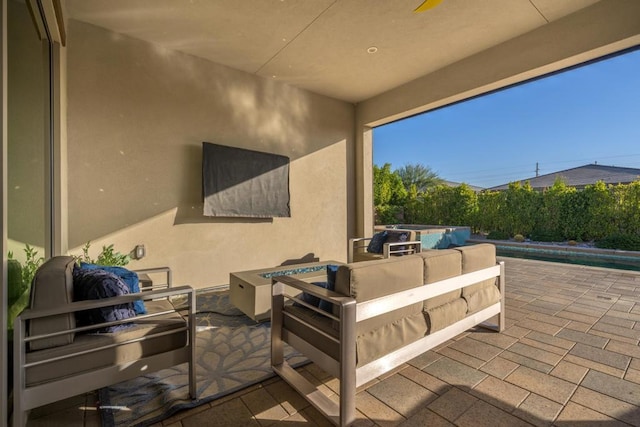 view of patio with a fenced in pool and an outdoor hangout area