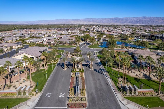 drone / aerial view featuring a mountain view