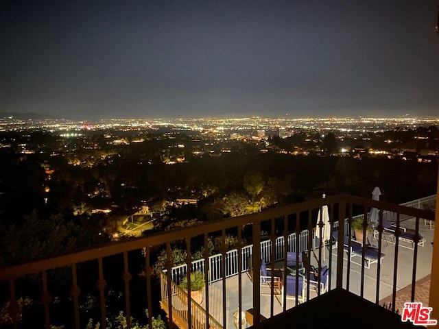 view of balcony at night