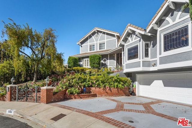 view of front of property with a garage