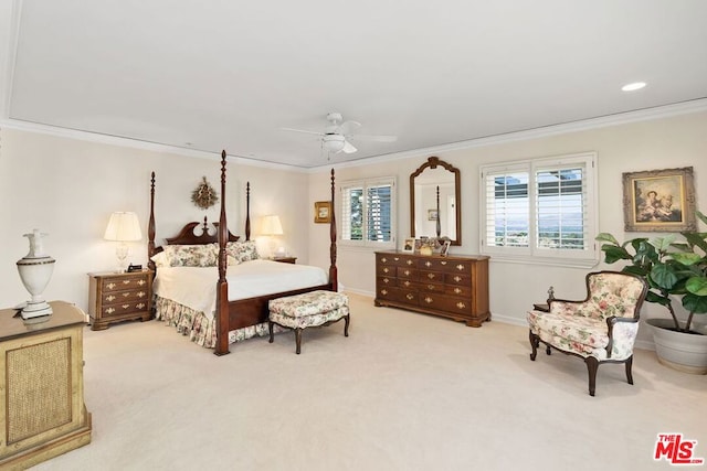 bedroom featuring ceiling fan, light colored carpet, and ornamental molding