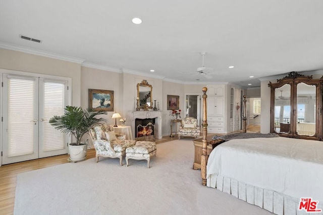 bedroom with ceiling fan, access to outside, french doors, and ornamental molding