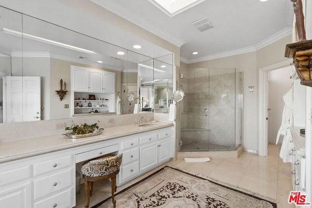 bathroom with tile patterned floors, walk in shower, crown molding, and vanity