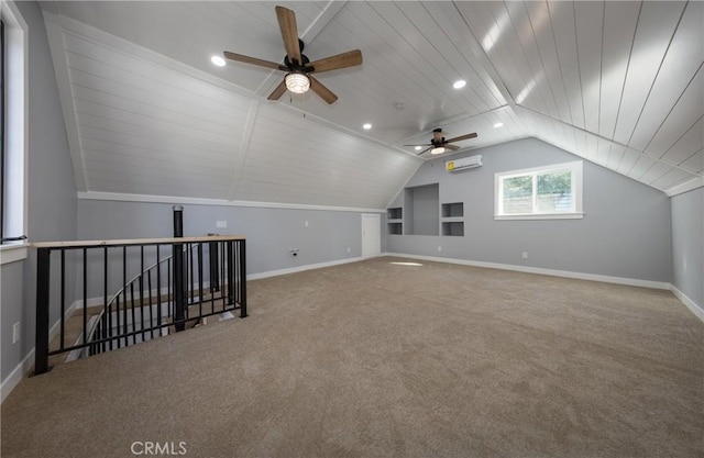 additional living space featuring ceiling fan, carpet floors, vaulted ceiling, an AC wall unit, and wooden ceiling