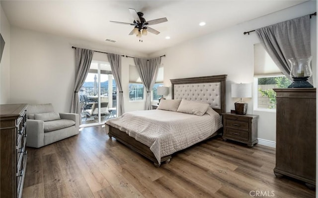 bedroom with wood-type flooring, access to exterior, and ceiling fan