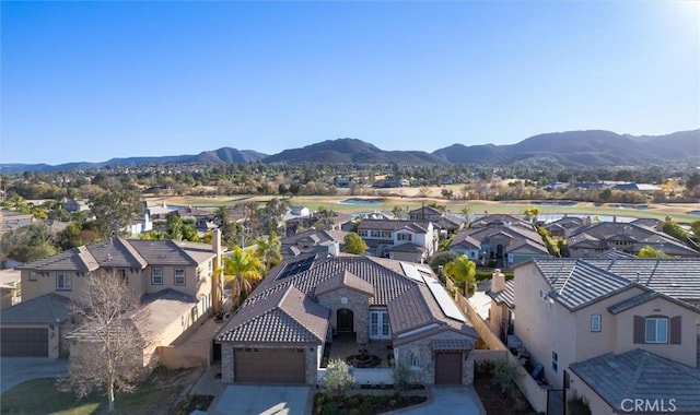 drone / aerial view featuring a mountain view