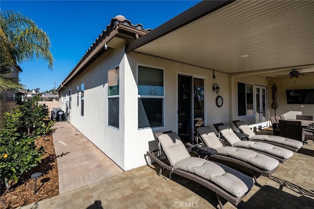 view of patio / terrace featuring an outdoor living space and ceiling fan