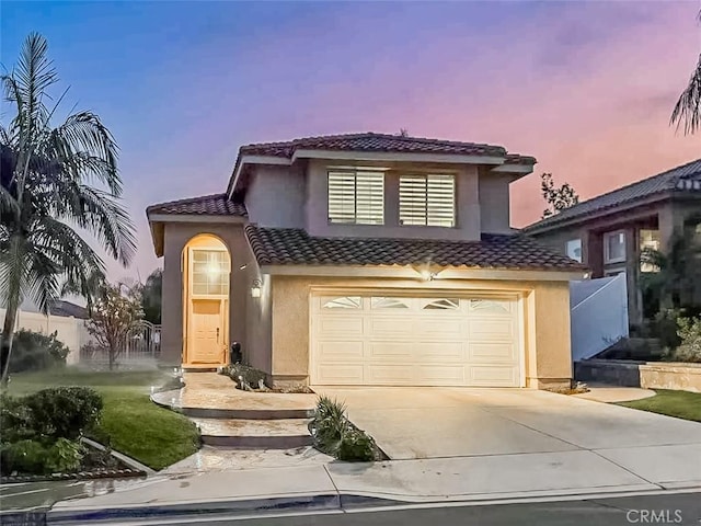 view of front of home with a garage