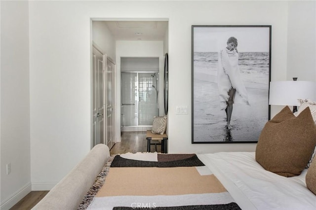 bedroom featuring wood-type flooring