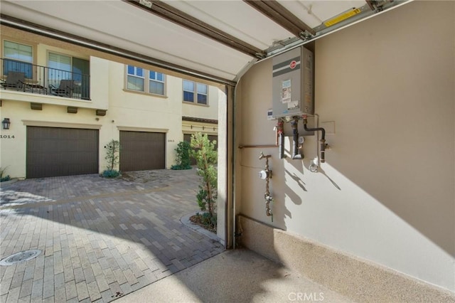 garage featuring water heater