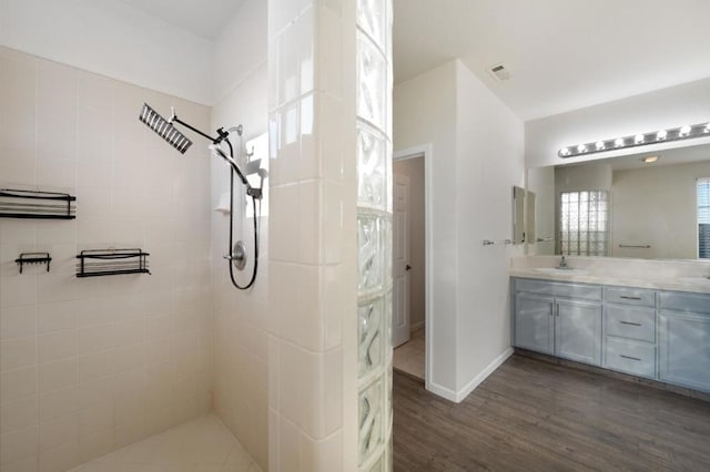 bathroom featuring vanity and wood-type flooring