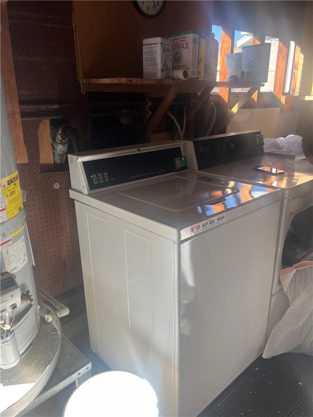 laundry room featuring washer / clothes dryer and gas water heater