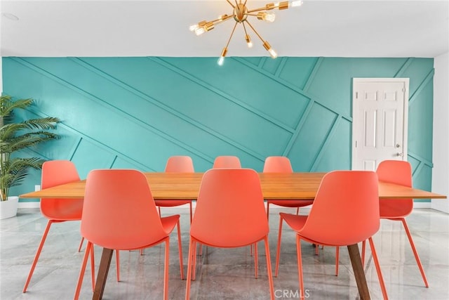 dining space featuring a chandelier