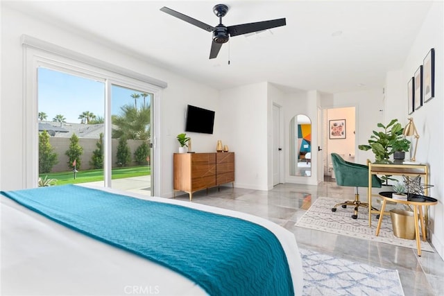 bedroom featuring ceiling fan and access to outside