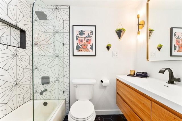 full bathroom featuring toilet, tile patterned floors,  shower combination, and vanity