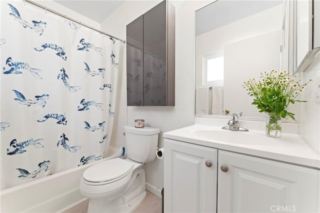 full bathroom featuring toilet, vanity, and shower / tub combo