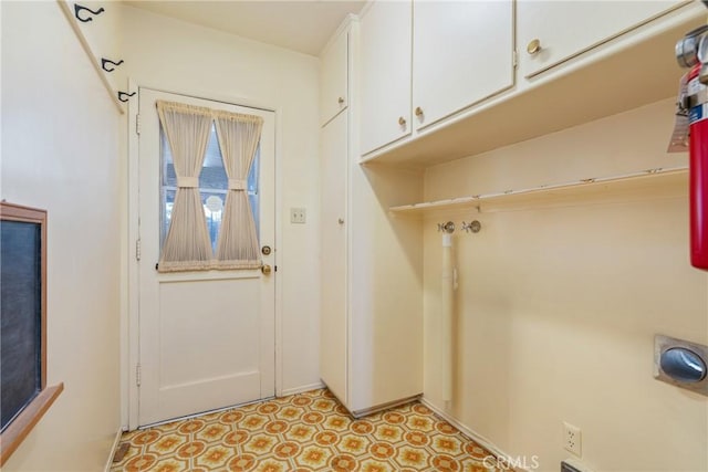 washroom featuring cabinets