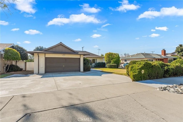 single story home featuring a garage